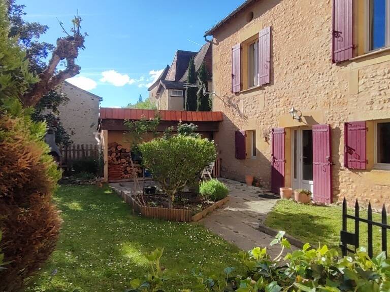 PÉRIGORD NOIR, CHARMANTE MAISON EN PIERRE DE 95 M² SH AVEC JARDIN + UN GARAGE DE 32M² ENVIRON NON ATTENANT SUR 640M² CLOS — photo 1