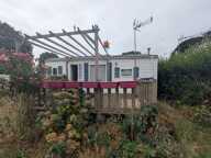 AMBON MOBIL-HOME DE 26m² ENVIRON 2 CHAMBRES AVEC TERRASSE BOIS SUR L'EXTÉRIEUR ET ABRIS DE JARDIN PARCELLE DE 200m² ENVIRON — photo 2