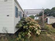 AMBON MOBIL-HOME DE 26m² ENVIRON 2 CHAMBRES AVEC TERRASSE BOIS SUR L'EXTÉRIEUR ET ABRIS DE JARDIN PARCELLE DE 200m² ENVIRON — photo 3