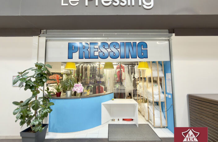 Pressing dans un hypermarché — photo 2