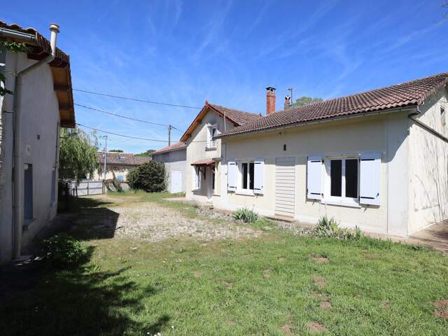 2 maisons habitables + grange sur terrain de 1200m2 — photo du bien