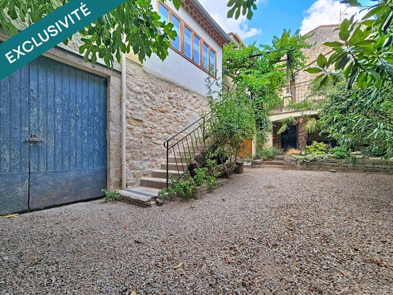Une superbe maison en pierre où charme de l'ancien, terrasses et volumes généreux se conjuguent à merveille. — photo 1