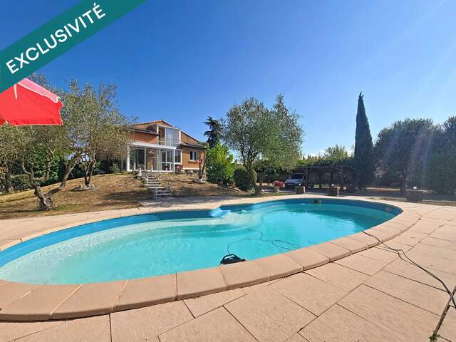 Une superbe villa avec piscine et 2145m2 de terrain paysager, dans l'un des secteurs les plus recherchés d'Hérépian. — photo du bien