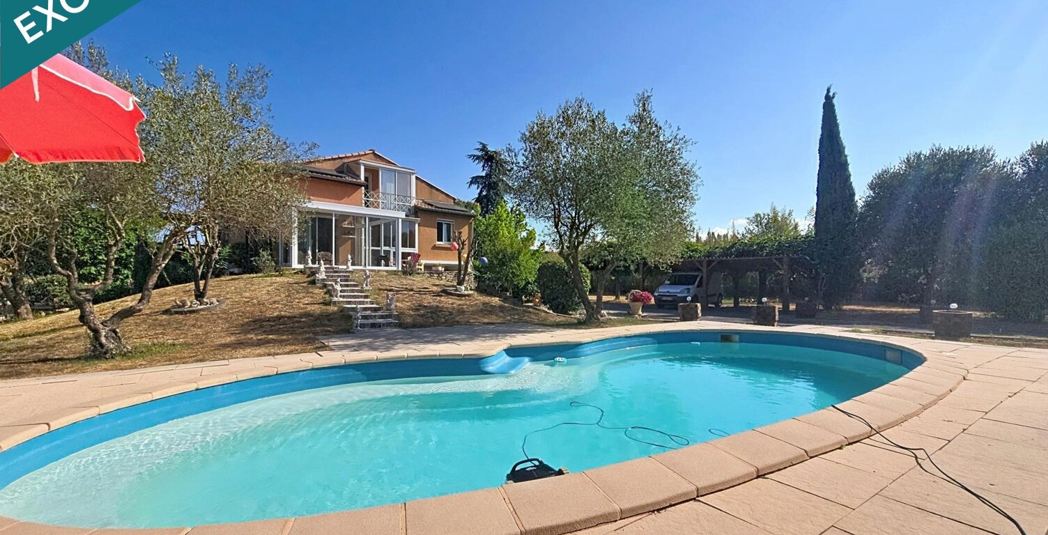 Une superbe villa avec piscine et 2145m2 de terrain paysager, dans l'un des secteurs les plus recherchés d'Hérépian. — photo 1