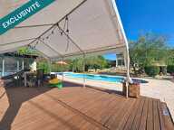 Une superbe villa avec piscine et 2145m2 de terrain paysager, dans l'un des secteurs les plus recherchés d'Hérépian. — photo 2