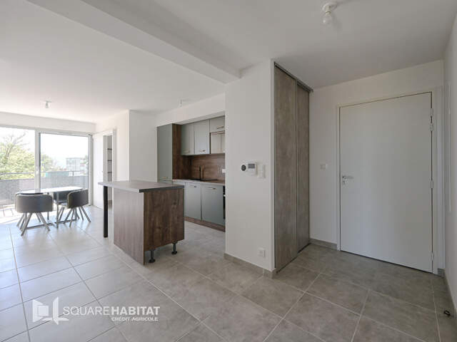 Appartement T3 récent avec balcon et double garage — photo du bien