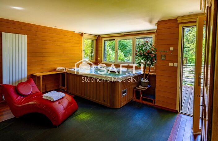Propriété d'exception au cœur du Pays Horloger  Un domaine unique de plus de 805 m² habitables dans un ecrin de verdure. — photo 3