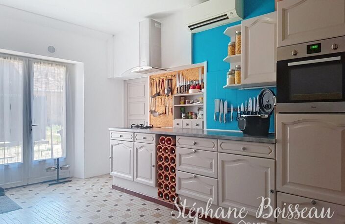 MAISON 7 PIECES 72300 LA CHAPELLE-D'ALIGNE — photo 3