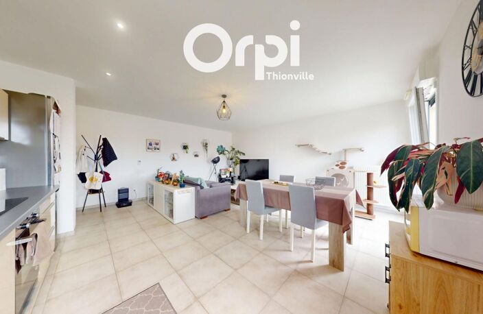 Bel appartement récent de 64m² avec balcon, deux chambres, un garage et une place de stationnement privative — photo 3
