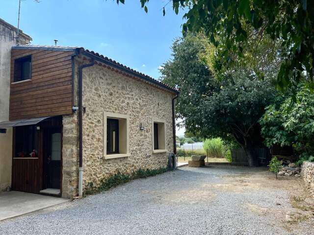 Maison de caractère en pierres T5 avec jardin et garage — photo du bien