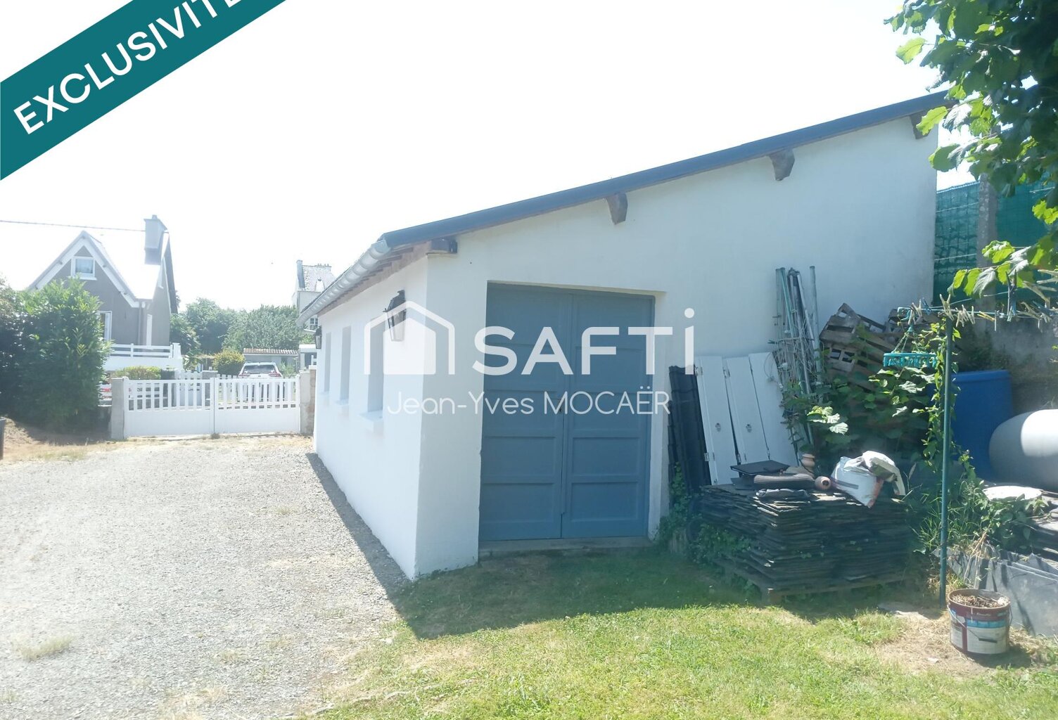 CHATEAUNEUF DU FAOU (29520), Terrain avec garage, petit atelier, parking privé, en centre bourg. — photo 1