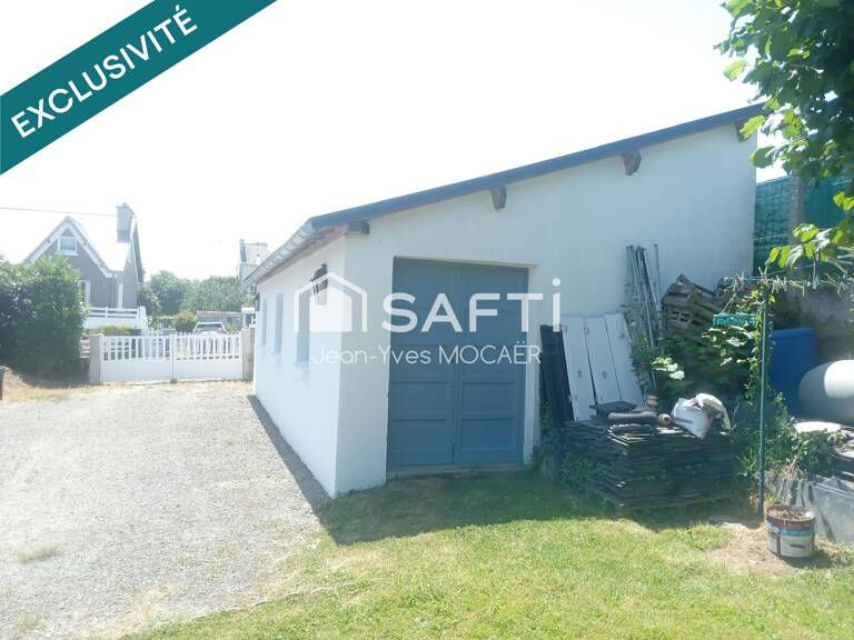 CHATEAUNEUF DU FAOU (29520), Terrain avec garage, petit atelier, parking privé, en centre bourg. — photo 1