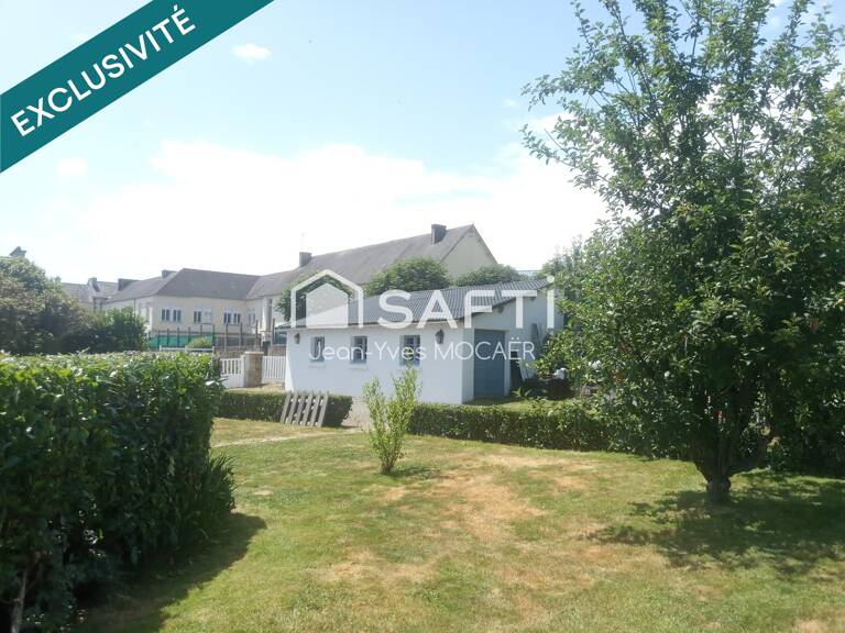 CHATEAUNEUF DU FAOU (29520), Terrain avec garage, petit atelier, parking privé, en centre bourg. — photo 1