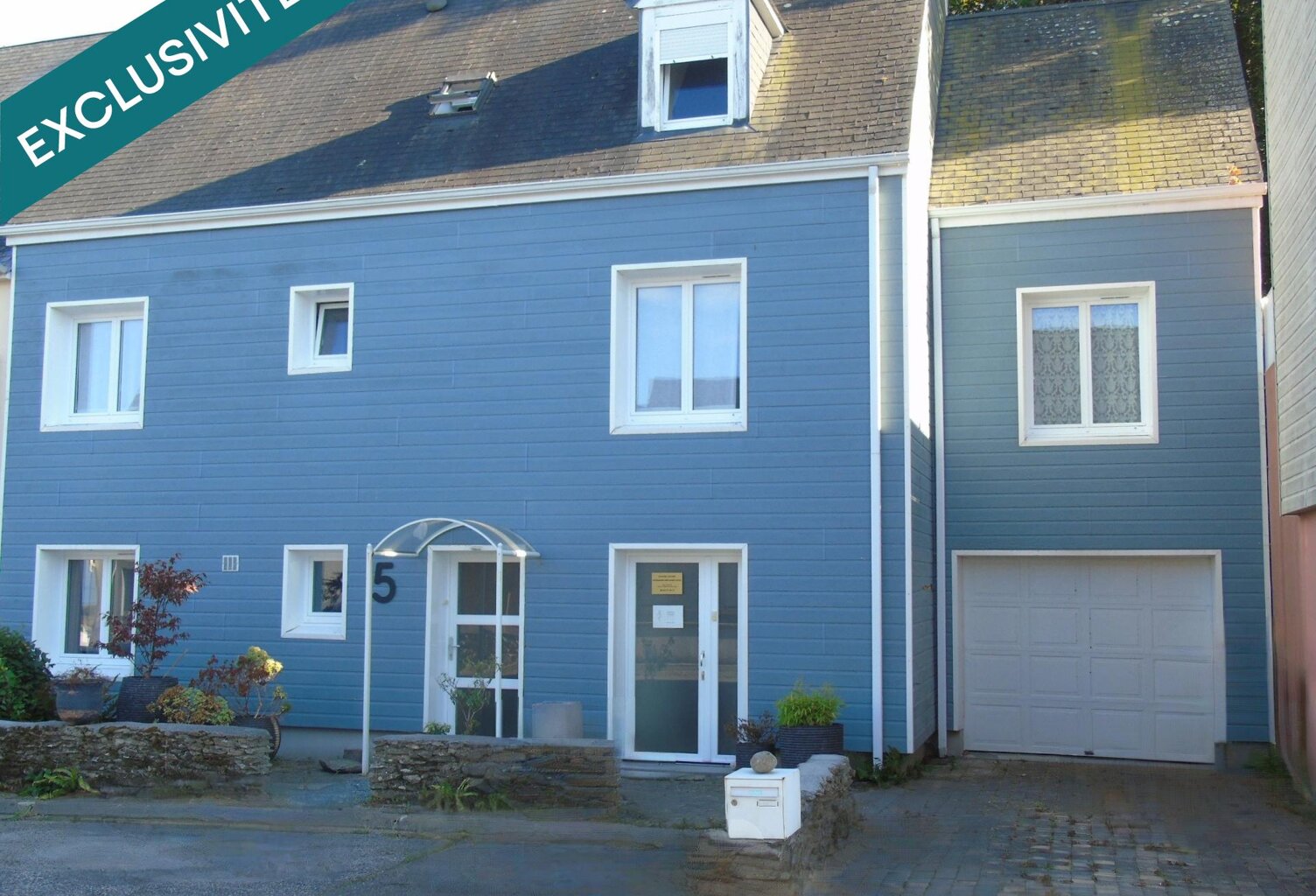 Querqueville  Une maison où chaque niveau offre un nouvel espace à vivre. — photo 1