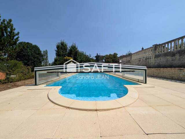Charmante maison avec piscine dans un quartier agréable avec sous-sol complet. — photo du bien