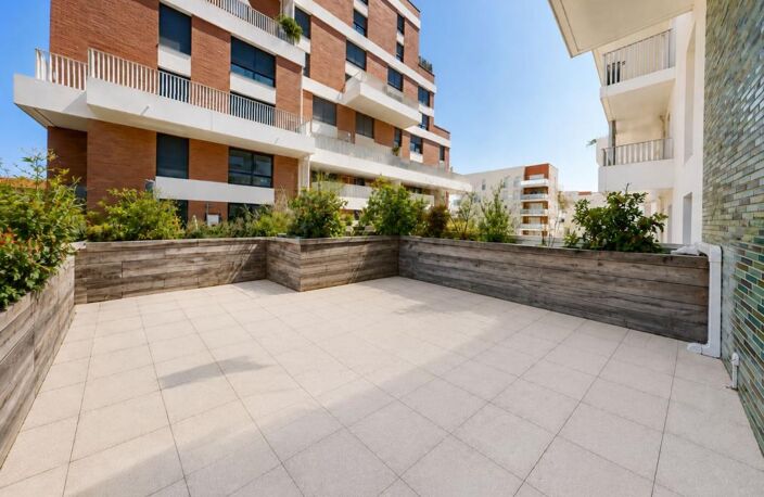 TOULOUSE – LA CARTOUCHERIE | T3 RÉCENT AVEC TERRASSE EXCEPTIONNELLE DE PLUS DE 50 M² - DPE C — photo 2