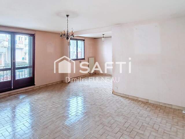 Appartement à rafraichir avec parking en sous sol securiser — photo du bien