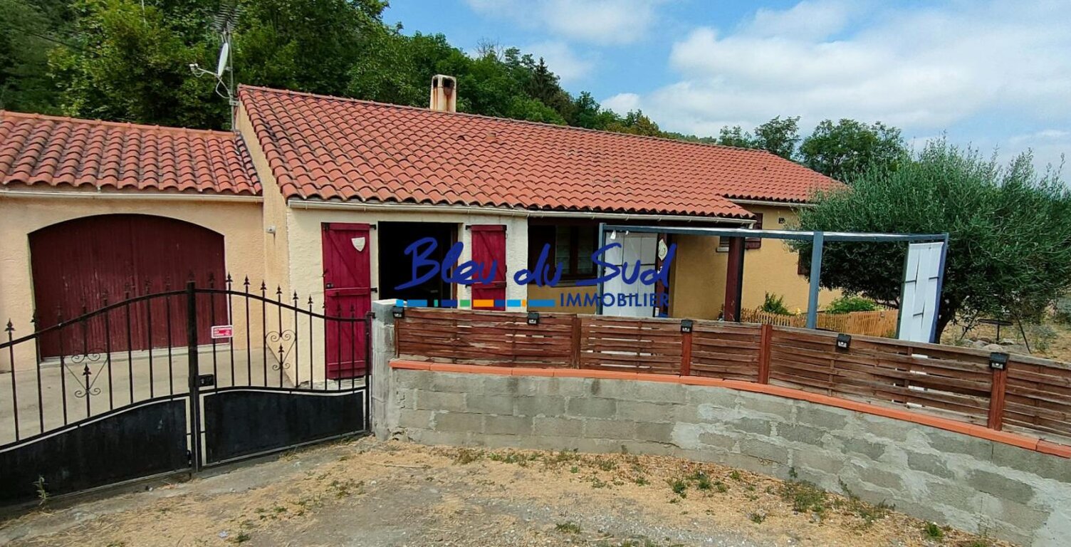 Maison de plain pied sur terrain de 600m² avec terrasse et gara — photo 1