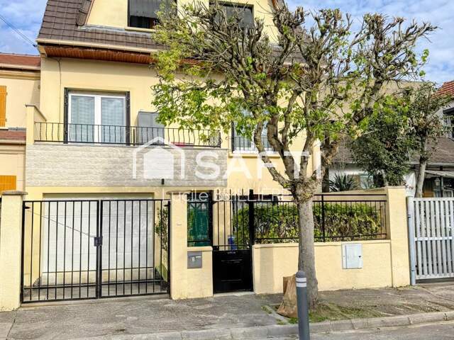 A Drancy 93700  Maison de 115 m², 5 pièces, 4 chambres, un séjour donnant sur un balcon, un terrain de 127 m² — photo du bien