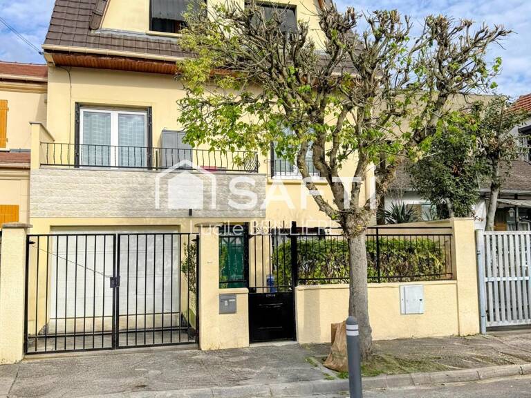 A Drancy 93700  Maison de 115 m², 5 pièces, 4 chambres, un séjour donnant sur un balcon, un terrain de 127 m² — photo 1