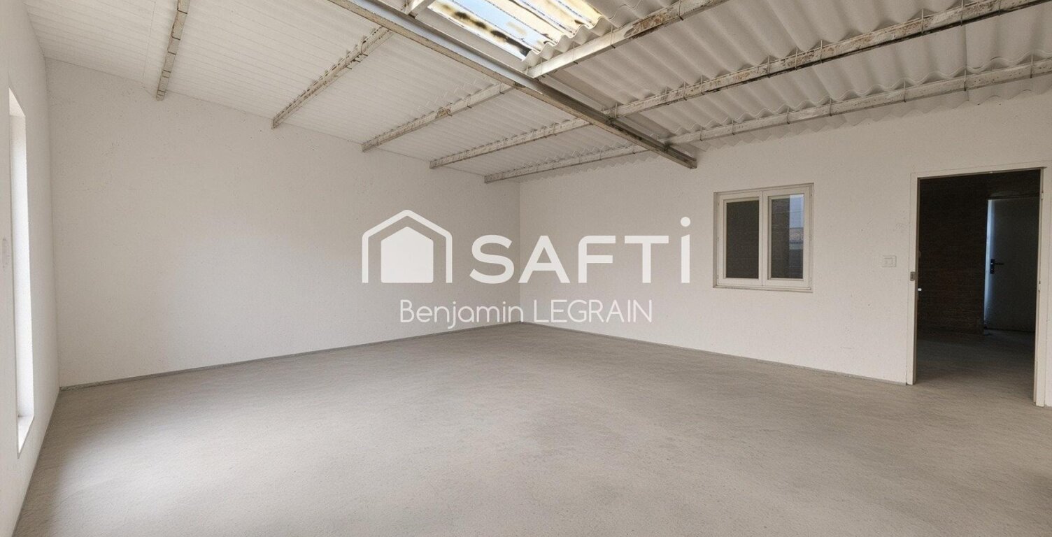 Garage de 90m2 sur terrain constructible — photo 1