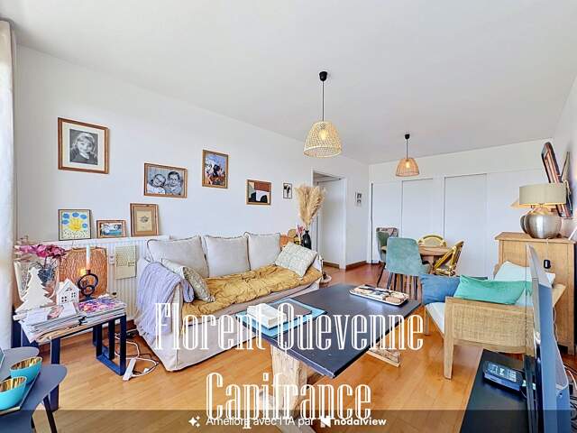 Appartement 2 pièces rénové avec balcon, parking et cave — photo du bien