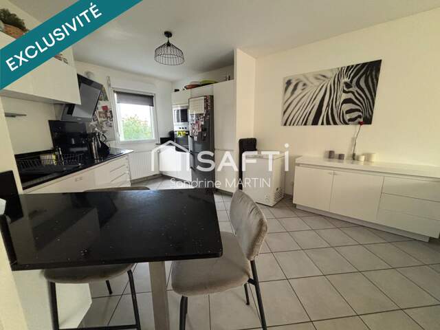 Appartement T4 de 2014, 76m2, ascenseur, balcon et parking sécurisé — photo du bien