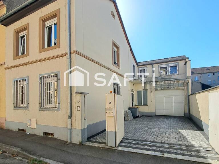 MULHOUSE  MAISON FAMILIALE AUX VOLUMES GÉNÉREUX !  169 m² habitables  4 chambres  Double garage  3 stationnements  Terrain 194 m² — photo 1