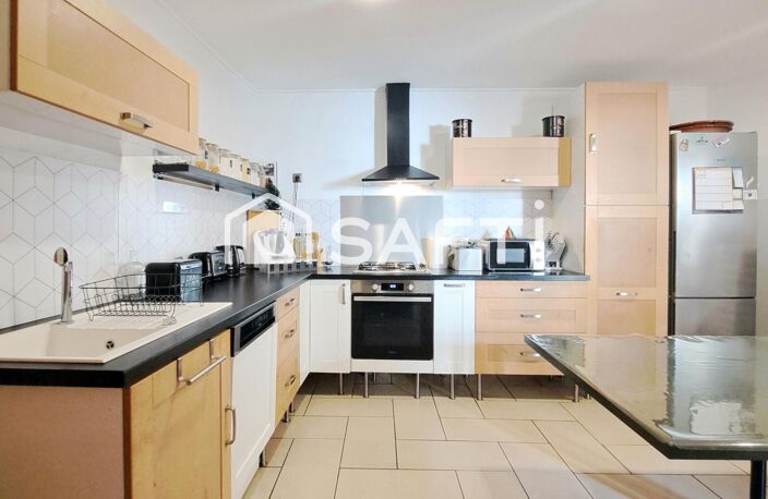 MULHOUSE  MAISON FAMILIALE AUX VOLUMES GÉNÉREUX !  169 m² habitables  4 chambres  Double garage  3 stationnements  Terrain 194 m² — photo 2
