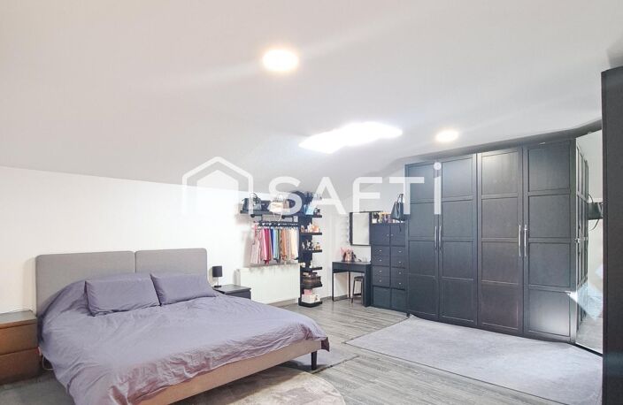 MULHOUSE  MAISON FAMILIALE AUX VOLUMES GÉNÉREUX !  169 m² habitables  4 chambres  Double garage  3 stationnements  Terrain 194 m² — photo 4