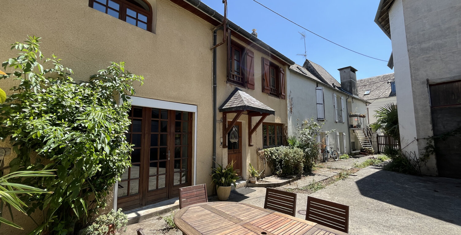 ENSEMBLE IMMOBILIER À FORT POTENTIEL EN CENTRE-VILLE D'ARGEL — photo 1