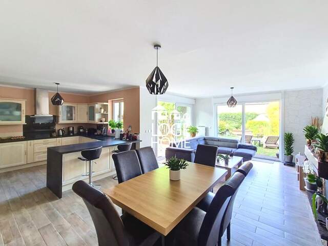 PLAIN PIED INDIVIDUEL – SÉJOUR OUVERT – CHAMBRES - JARDIN – GRAND GARAGE + STATIONNEMENTS — photo du bien