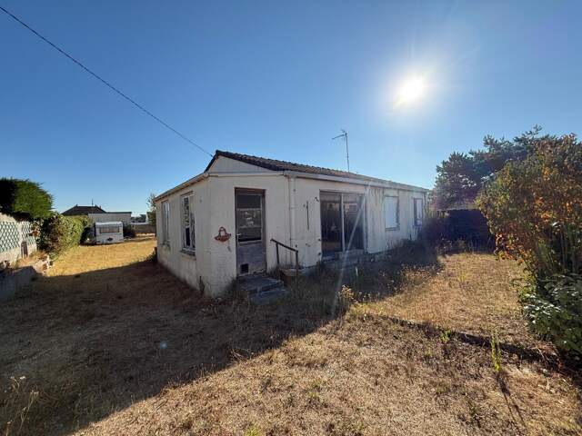 Maison 60m2 avec terrain de 721m2 proche plage — photo du bien