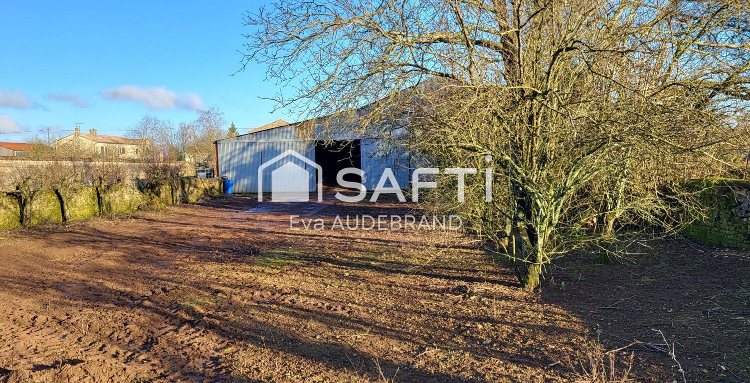 Hangar avec panneaux photovotaïques et parcelle constructible — photo 1