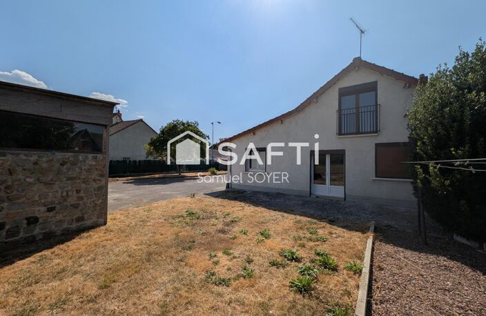 ENSEMBLE DE 2 HABITATIONS AVEC GARAGES ET JARDIN — photo 2
