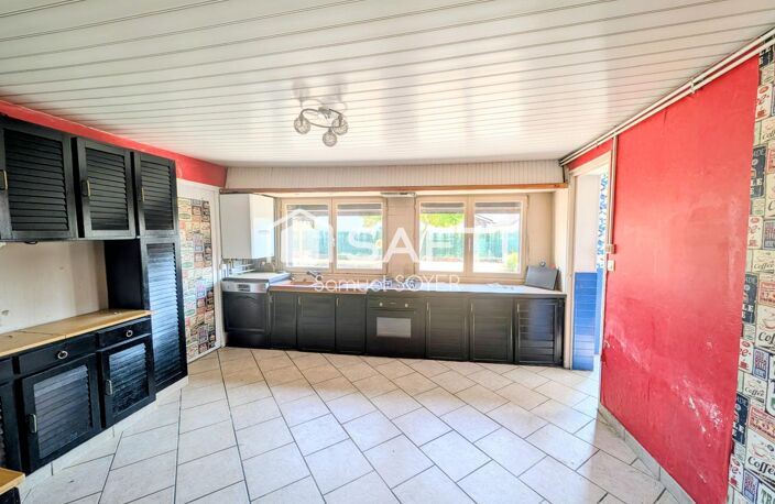 ENSEMBLE DE 2 HABITATIONS AVEC GARAGES ET JARDIN — photo 5