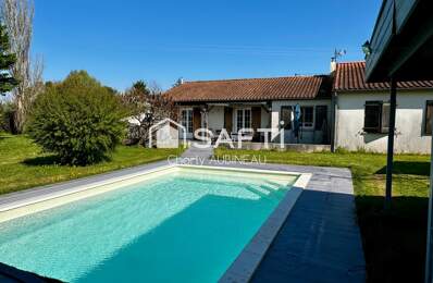 À vendre Maison de plain-pied avec piscine et grand terrain — photo du bien
