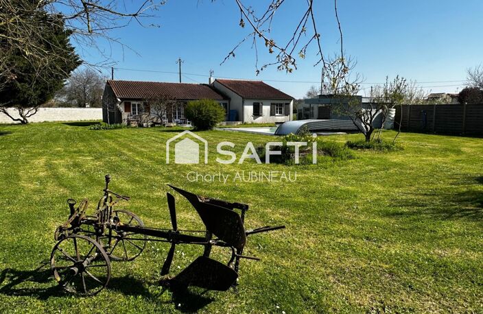 À vendre Maison de plain-pied avec piscine et grand terrain — photo 2