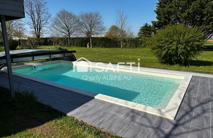 À vendre Maison de plain-pied avec piscine et grand terrain — photo 4