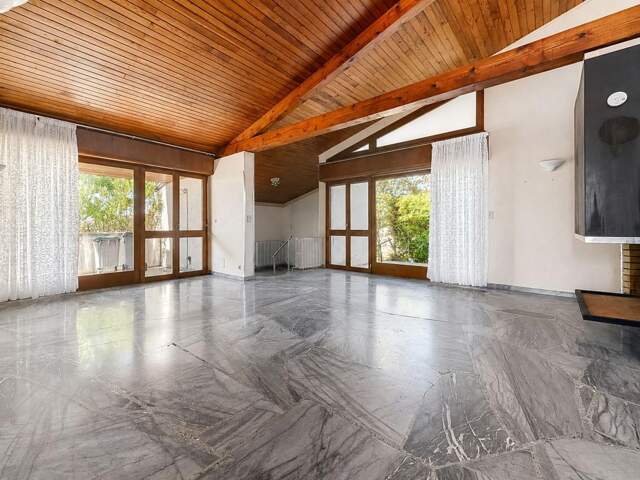Maison d’architecte lumineuse avec 3 chambres, bureau, sous-sol et terrain de 964 m² — photo du bien