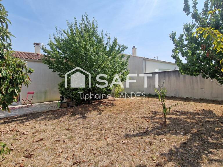 Maison de plain-pied avec jardin arboré. — photo 1