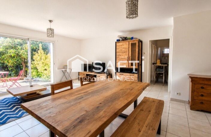 Maison de plain-pied avec jardin arboré. — photo 3