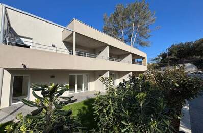 Appartement T3 neuf avec terrasse, jardin et garages — photo du bien