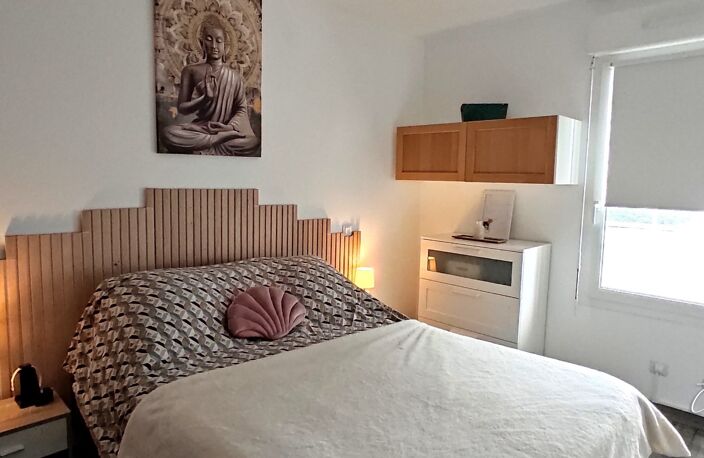 MARCHEPRIME – BEL APPARTEMENT 3 PIÈCES / 2 CHAMBRES AVEC GRAND BALCON — photo 4