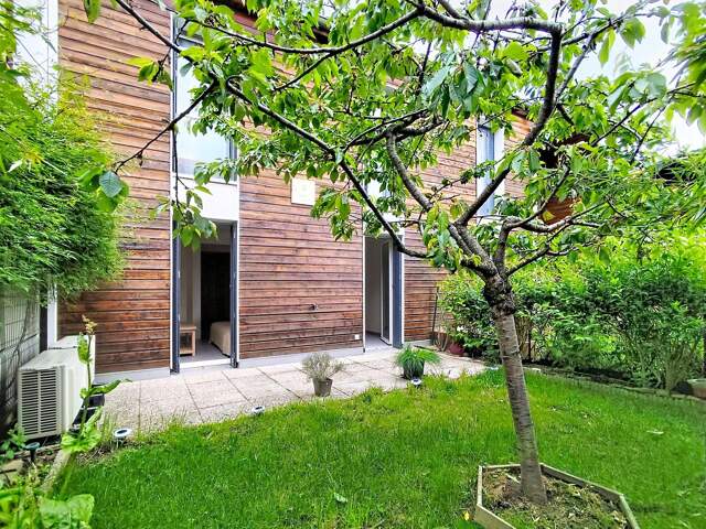Maison mitoyenne 3 chambres avec jardin — photo du bien
