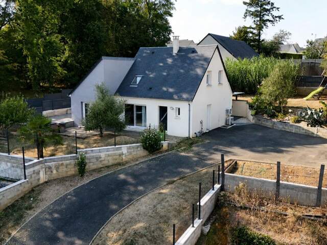 Maison bâtie en 2013, vie de plain pied, DPE B — photo du bien