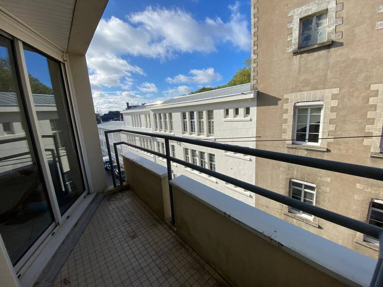 T2 _ 49.31m2 _ St Mihel avec balcon et place de parking — photo 1
