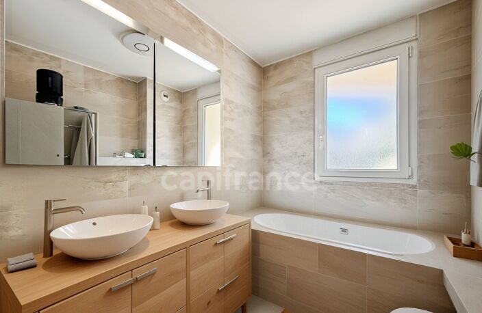Appartement à vendre 3 pièces DIVONNE LES BAINS (01) - 91m2 - jardin (350m2), cave (10m2), garage (21m2) — photo 3