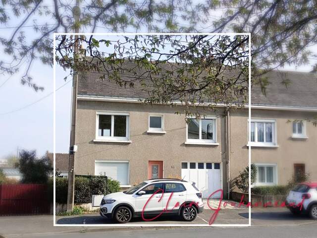 Maison  à fort potentiel avec jardin et grand garage - — photo du bien