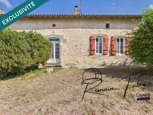 Maison en pierre de 230 m2 avec 4 chambres, garage attenant et arrières chais — photo du bien
